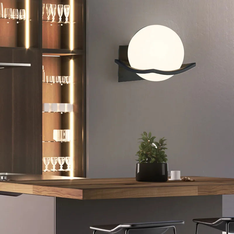 Makar European Opal Glass Globe Wall Sconce – Minimalist Metal Cradle Wall Light in Gold, Black or White for Bedroom & Hallway