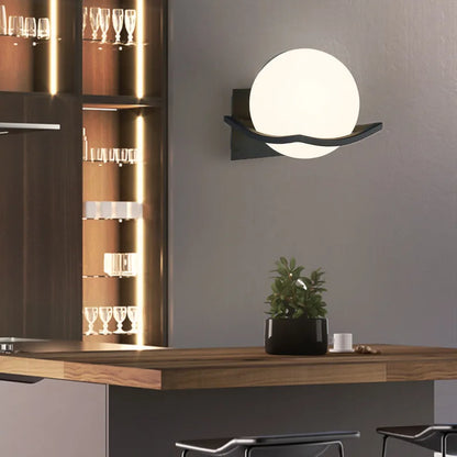 Makar European Opal Glass Globe Wall Sconce – Minimalist Metal Cradle Wall Light in Gold, Black or White for Bedroom & Hallway