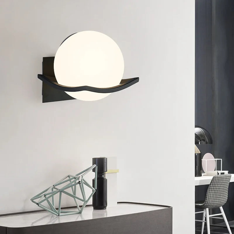 Makar European Opal Glass Globe Wall Sconce – Minimalist Metal Cradle Wall Light in Gold, Black or White for Bedroom & Hallway