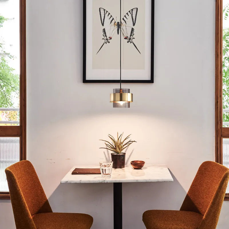 Nordic Smoked Glass Pendant Light with Brushed Brass Band – Modern Cylinder Hanging Lamp in Amber or Smoke Grey