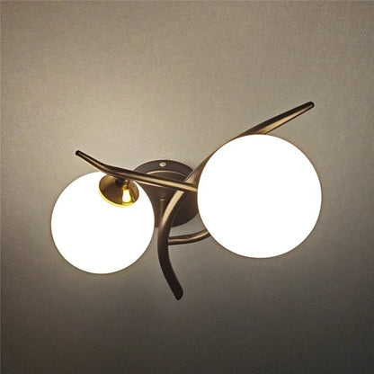 Lunara Nordic Dual-Globe LED Wall Light – Sculptural Gold or Black Frame Wall Sconce with Frosted Glass, Left or Right
