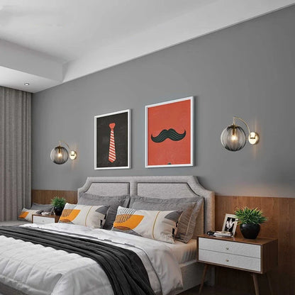 Modern Tinted Glass Ball Wall Lamp – Curved Brass Arm Wall Sconce with E27 Bulb in Red, Blue, Amber or Smoke Grey